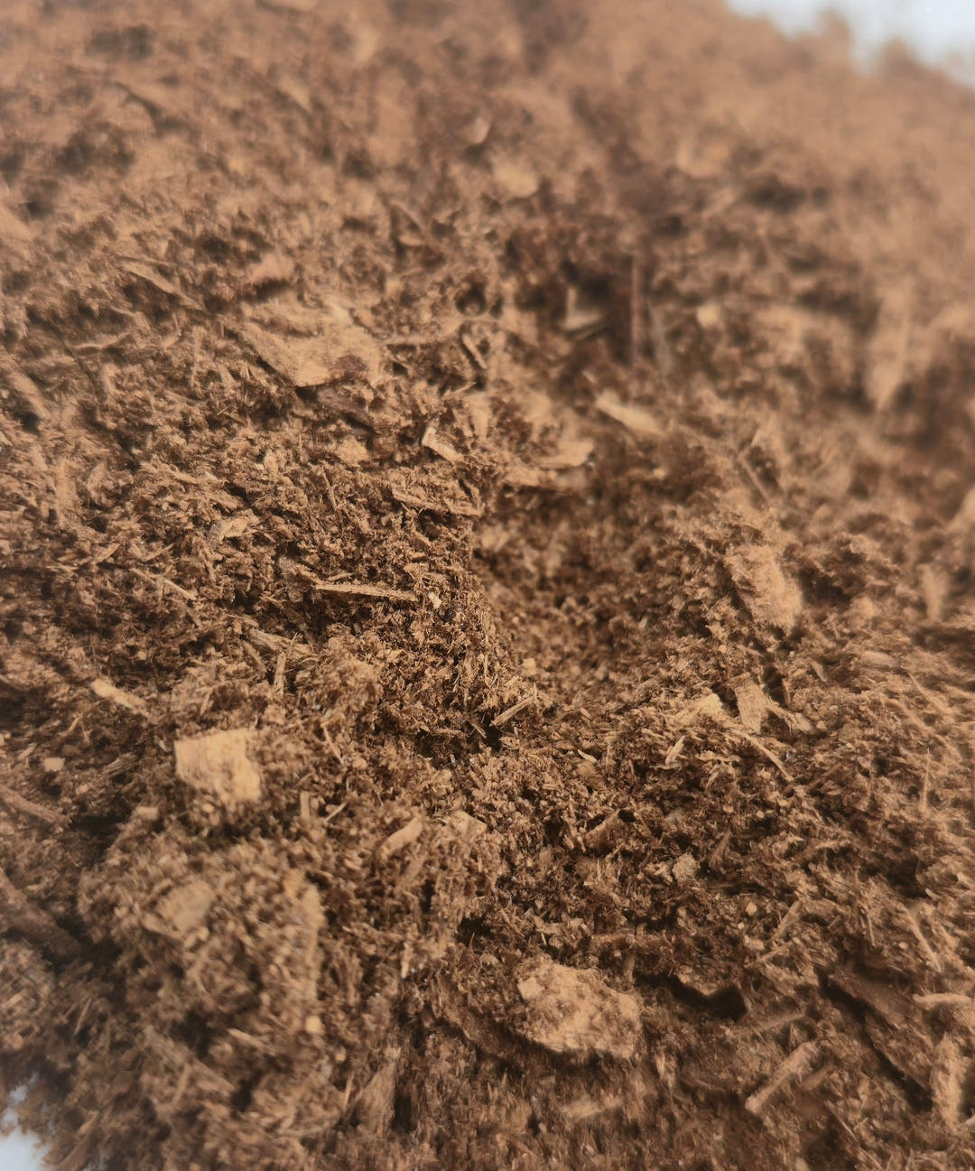 Fermented flake soil, white-rotted hardwood degraded by bacteria and micro-fungi