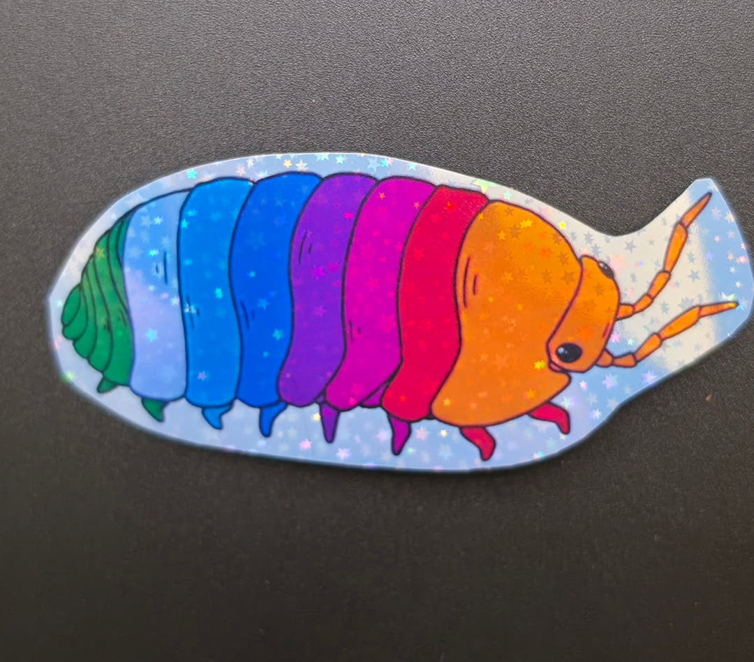 Sticker of a cartoon isopod whose segments run green, blue, purple, pink and red to an orange head.