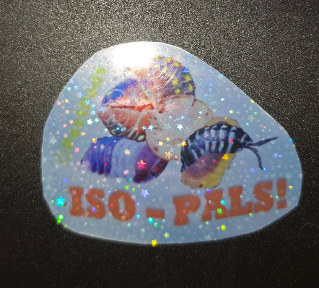 Rounded sticker of several patterned isopods above the words ISO-PALS! in orange, with a star glitter finish.