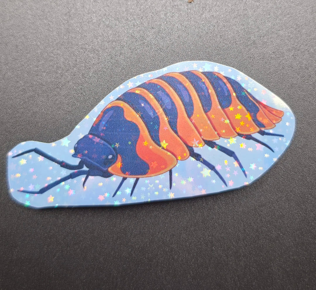 A vinyl sticker of a navy blue isopod with orange stripes across its segments, set on a starry blue shape.