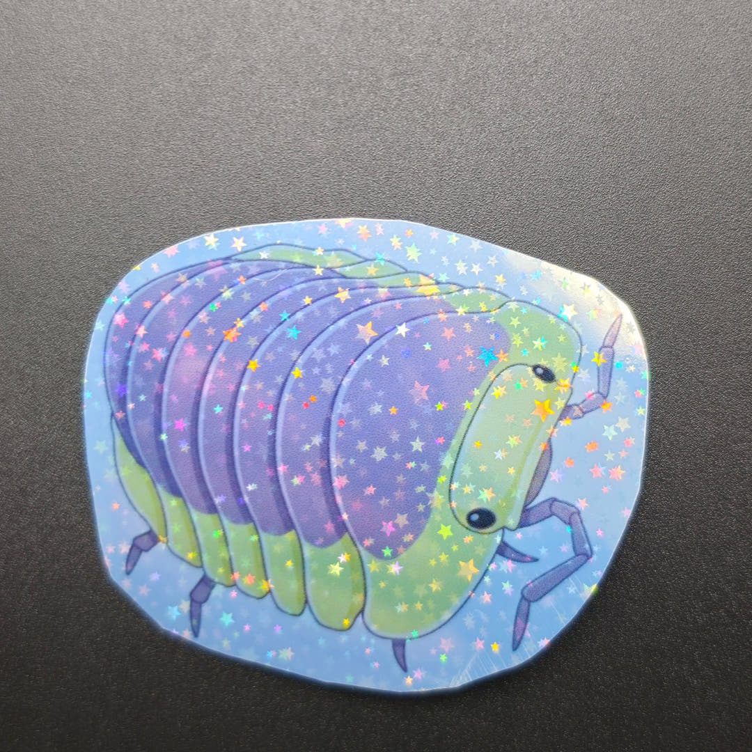A vinyl sticker of a purple isopod with a lime green head and lilac legs, covered in holographic star flecks.