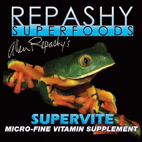 Black Repashy Superfoods label showing a green tree frog with orange legs and the words Supervite, Micro-Fine Vitamin Supplement.