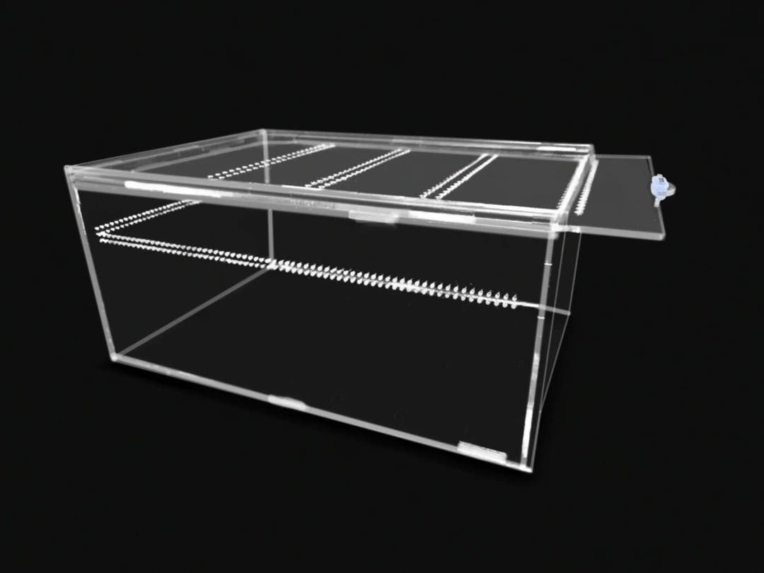 Clear acrylic terrestrial enclosure on black, its sliding lid pushed back so it overhangs one end.